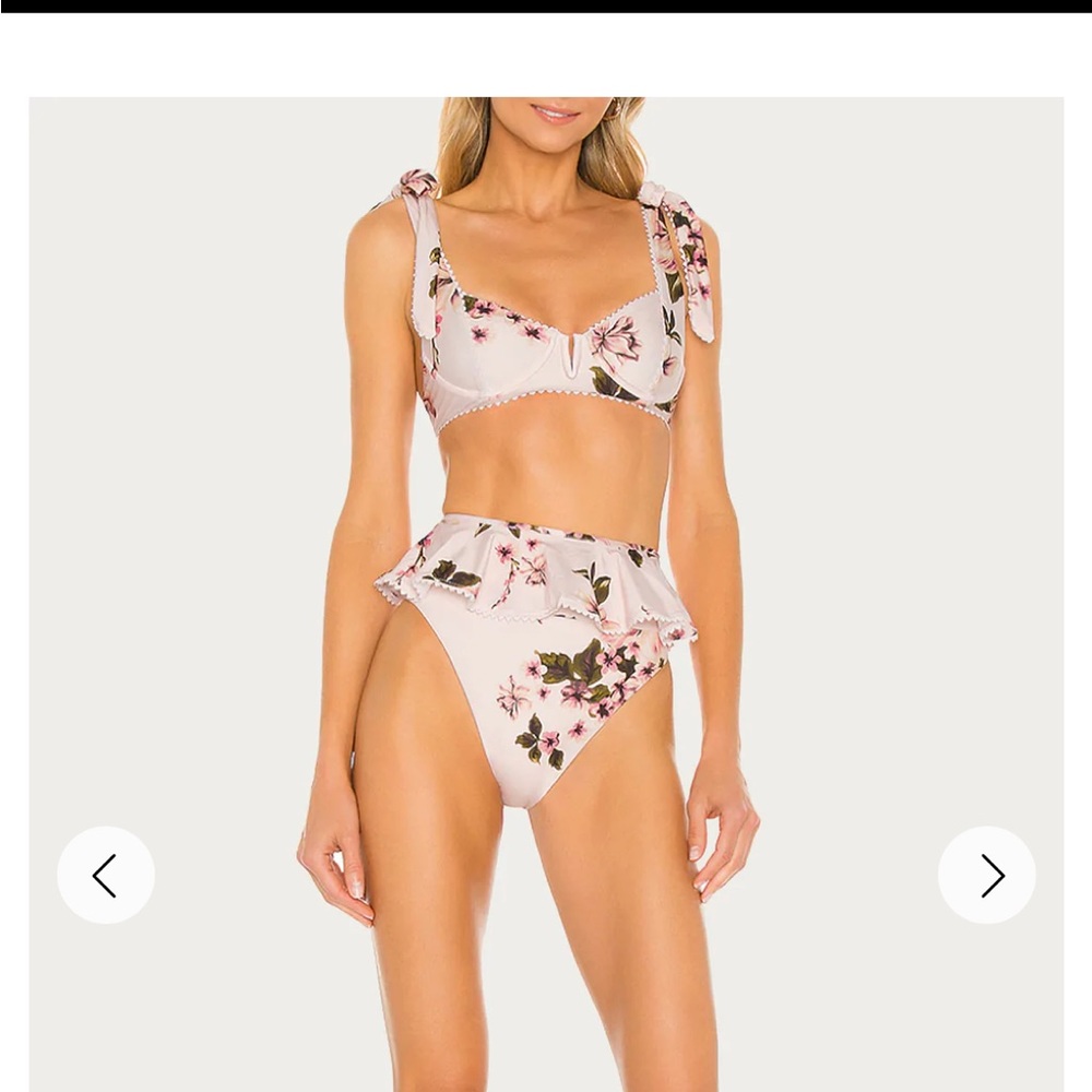 Brand New w tags. Size small Beach Riot two piece.